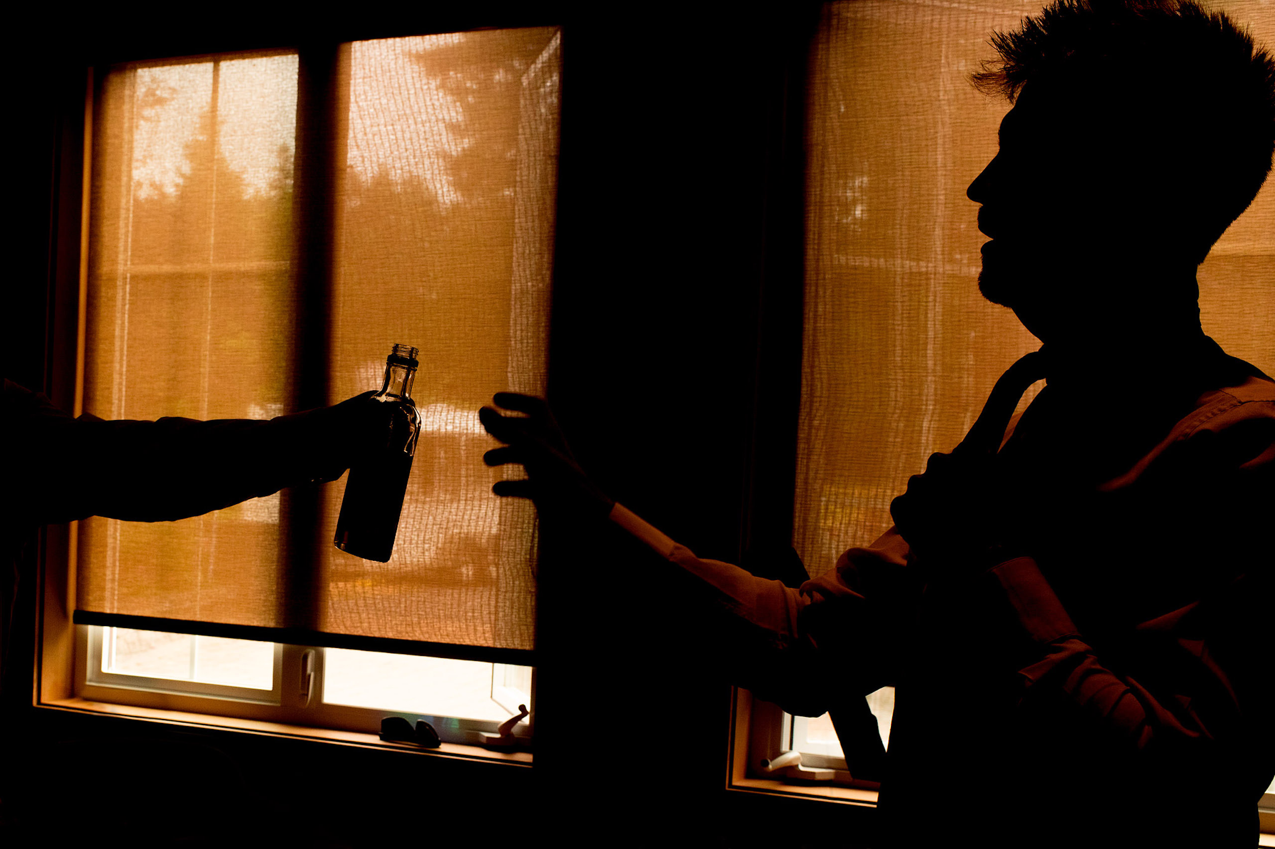 a room of groomsmen getting ready - Qualicum Wedding Photographer