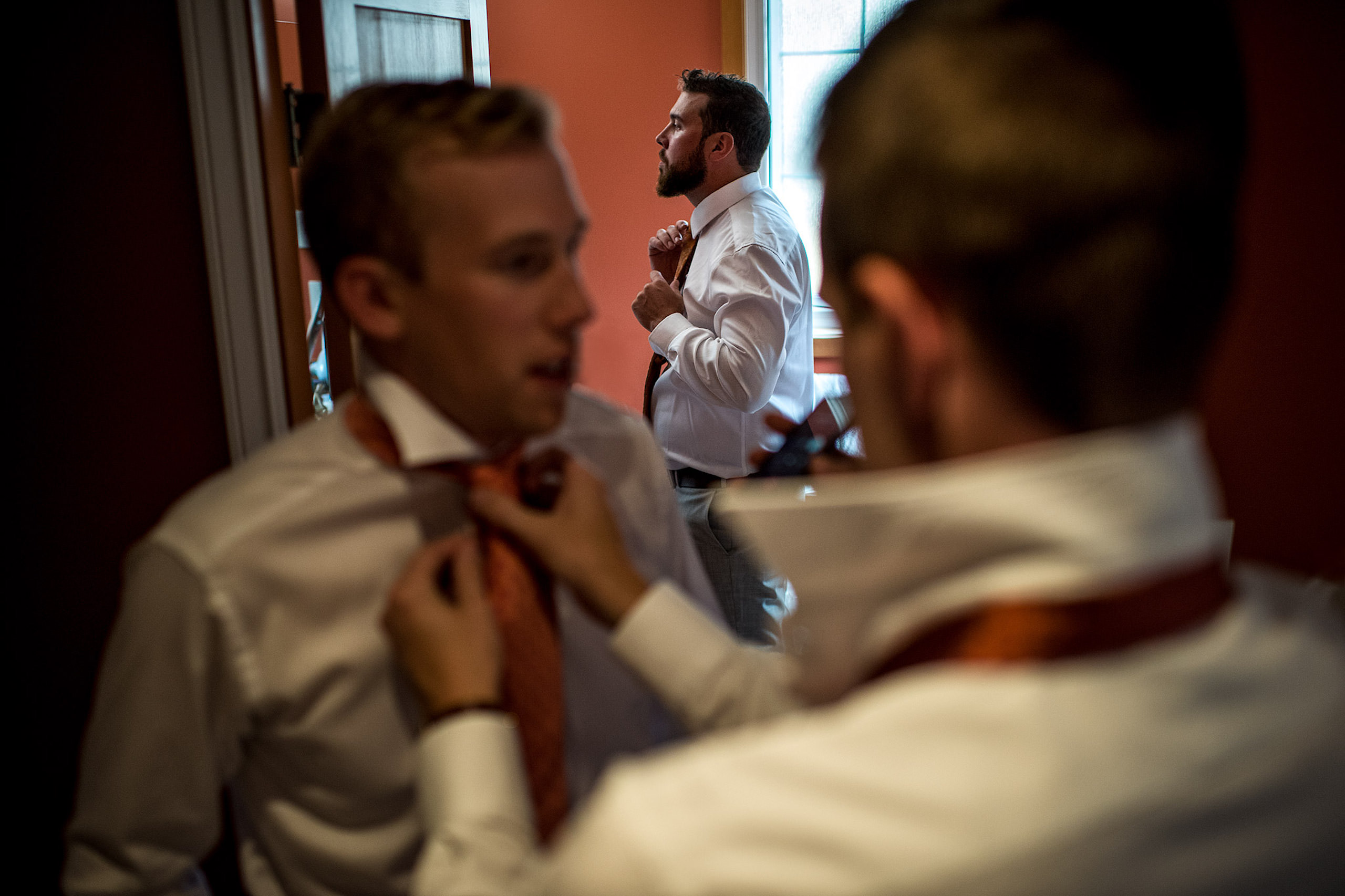 a room of groomsmen getting ready - Qualicum Wedding Photographer