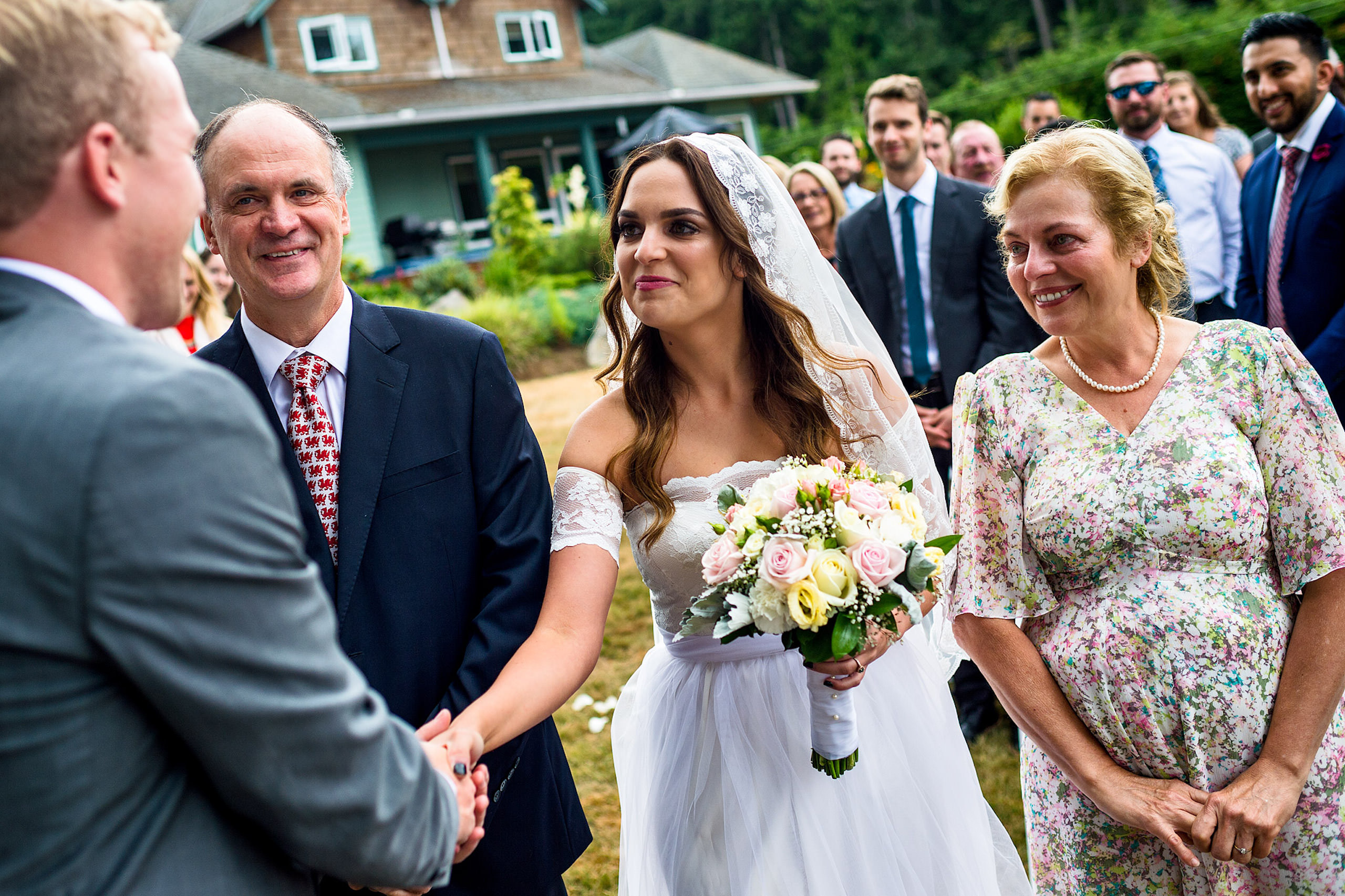 A bride seeing her groom for the first time at a backyard wedding in BC - Qualicum Wedding Photographer