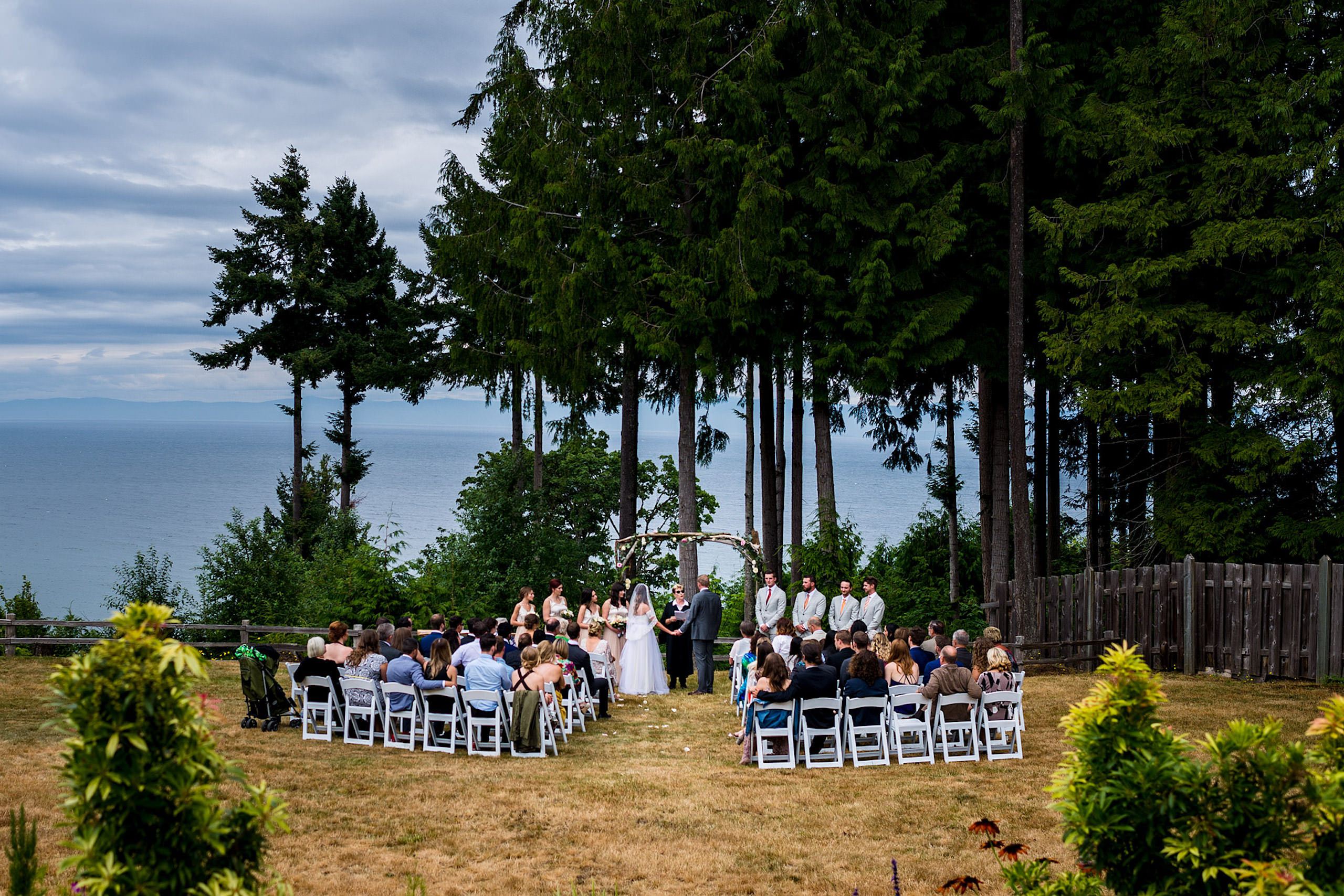 A wide angle photograph of a backyard wedding in BC - Qualicum Wedding Photographer