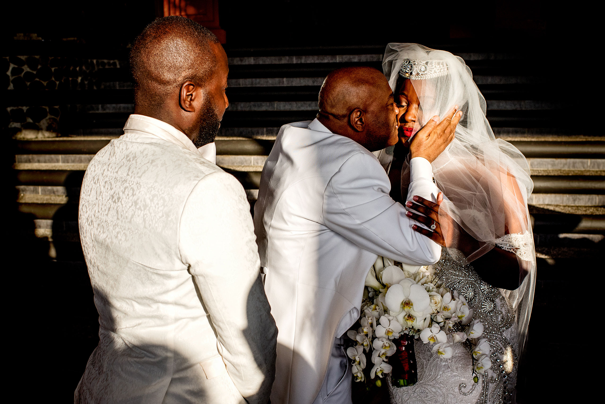 dad kissing his daughter at ceremony at Zephyr Palace Destination Wedding in Costa Rica by Sean LeBlanc