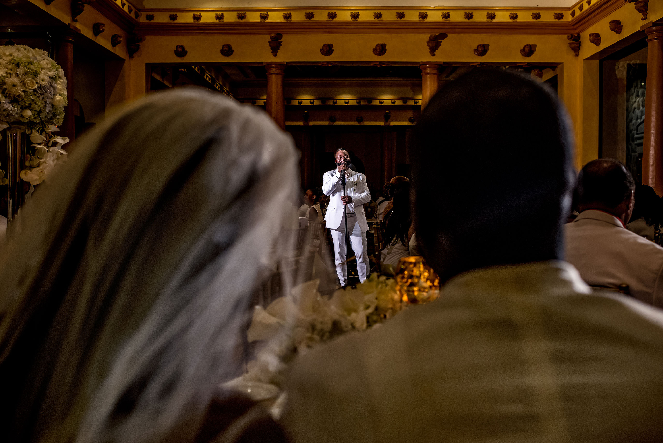 a groomsmen giving a speech at Zephyr Palace Destination Wedding in Costa Rica by Sean LeBlanc