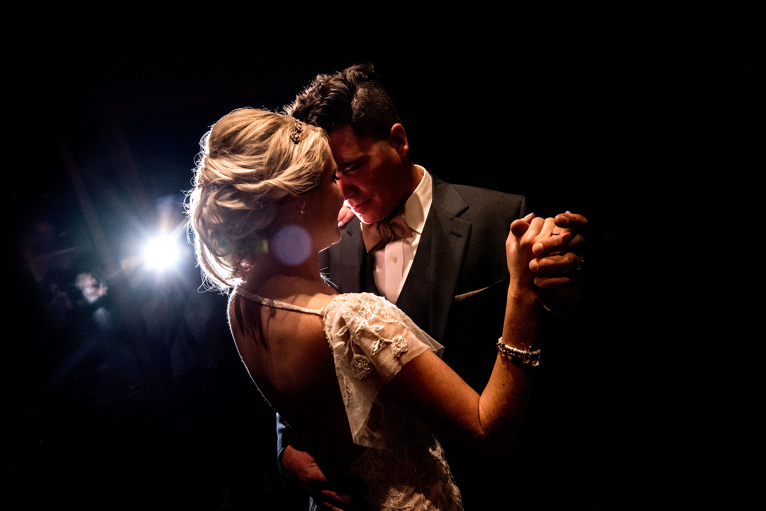 bride and groom having first dance at winter kicking horse wedding