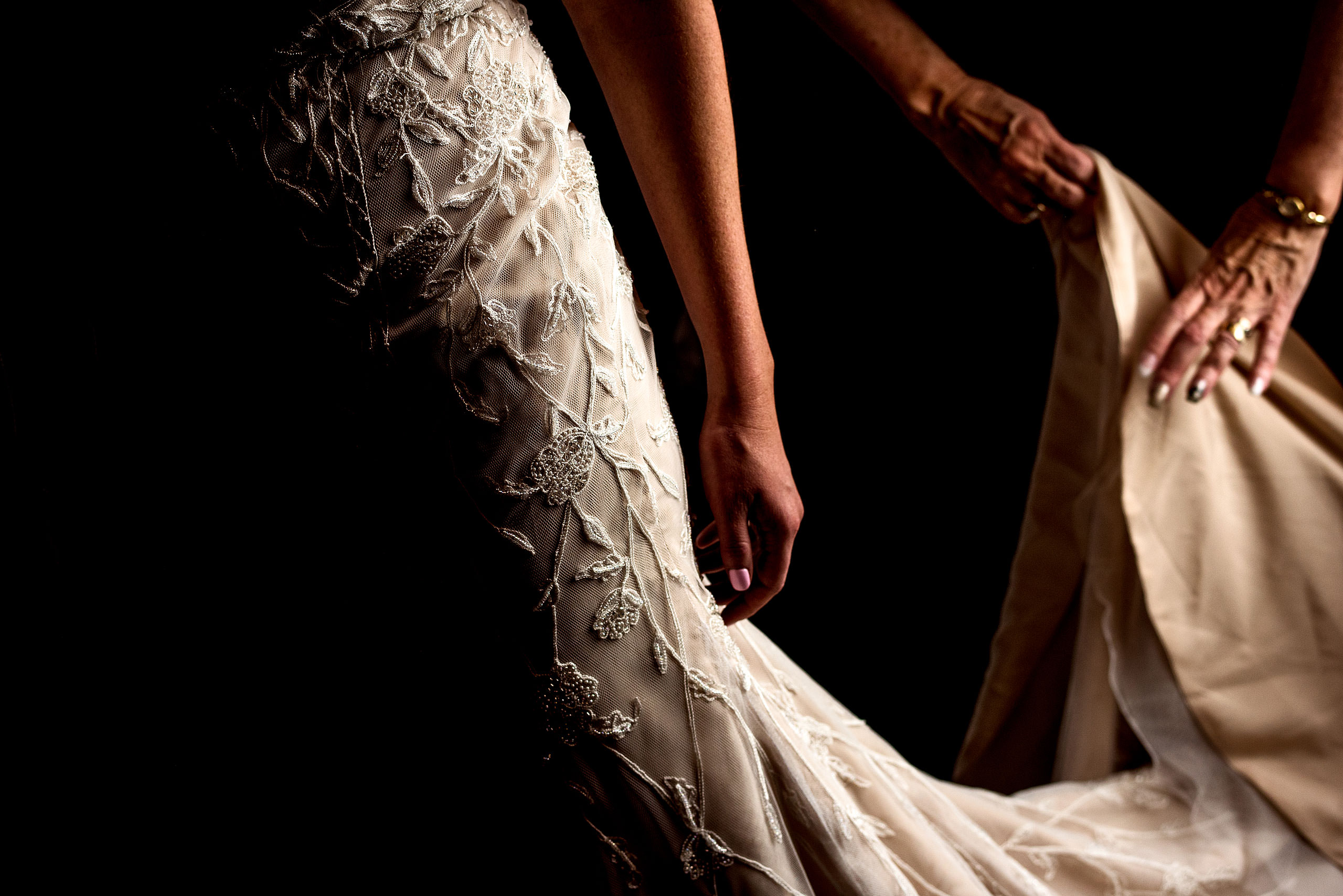 detail photograph of a bride's wedding dress by calgary wedding photographers