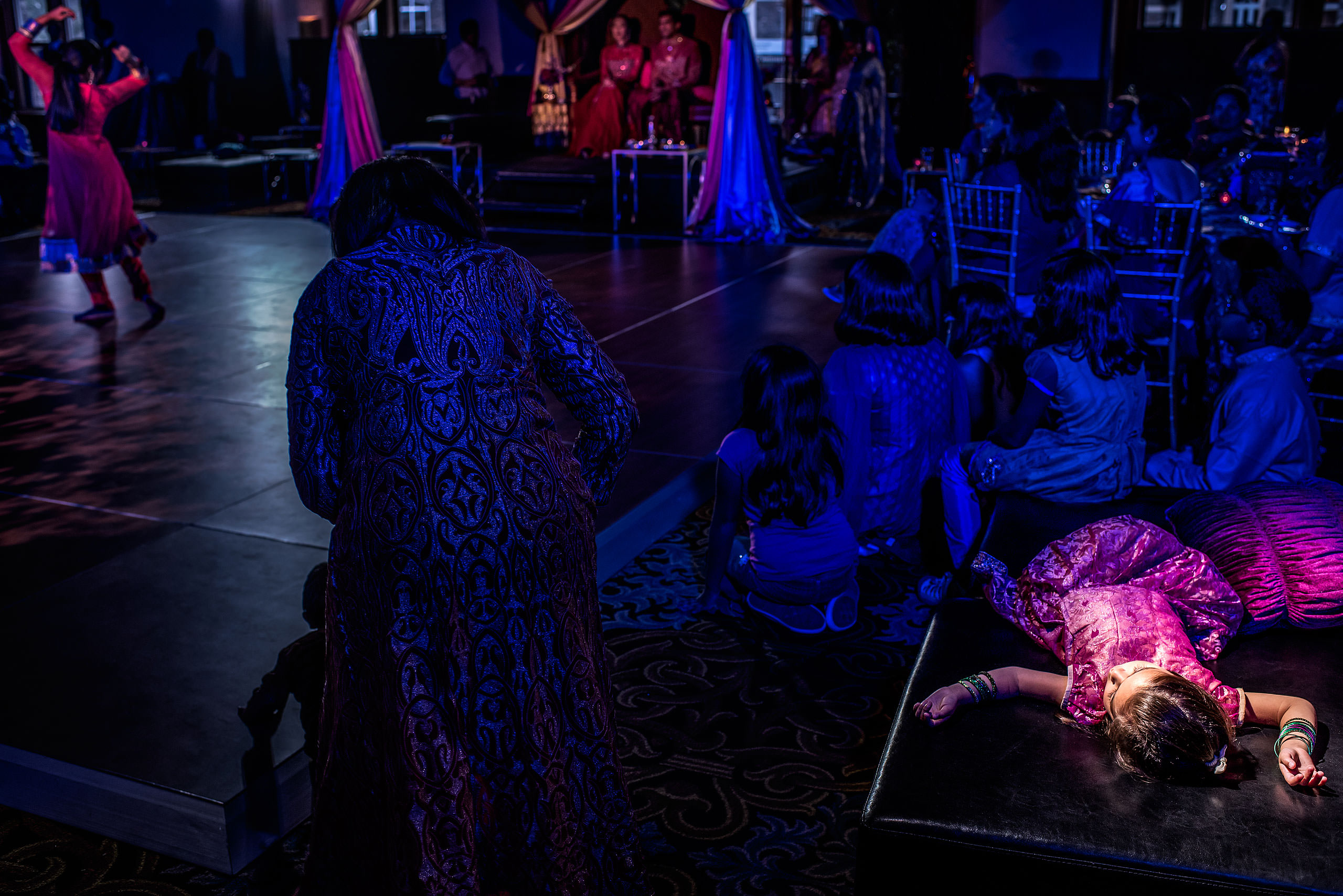 little girl sleeping at reception by Banff wedding photographer