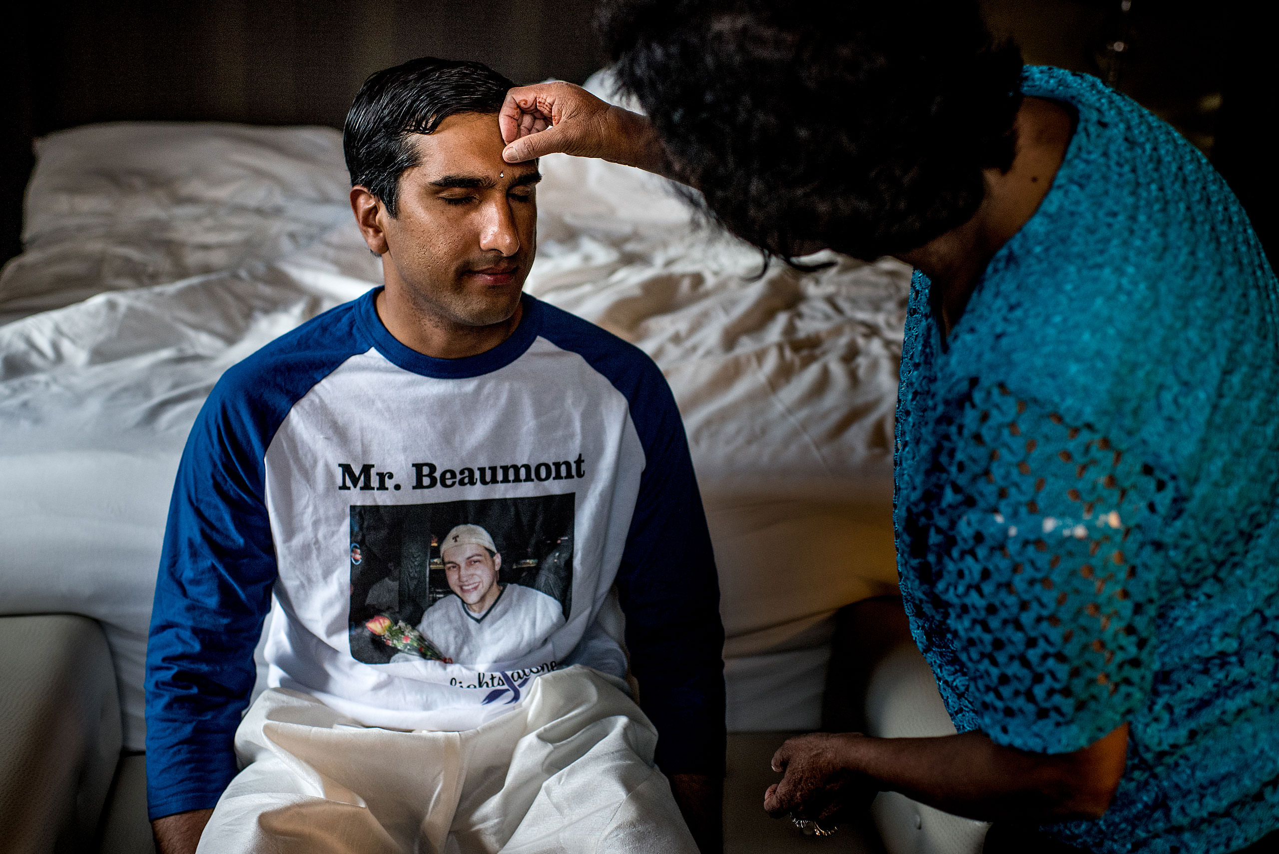 an indian groom getting ready for day for cascade ballroom banff springs wedding by sean leblanc