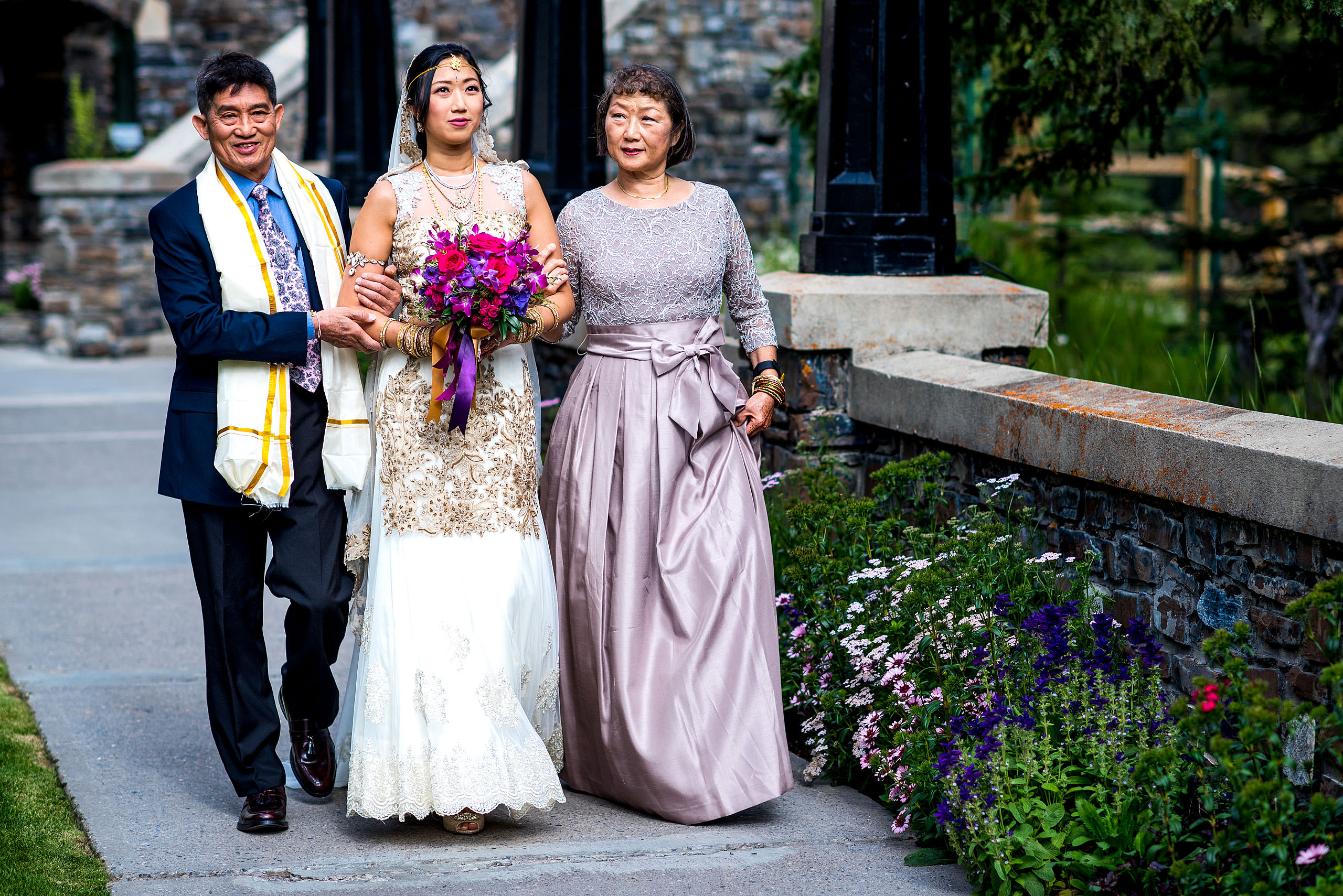 parents walking bride down the aisle for cascade ballroom banff springs wedding by sean leblanc