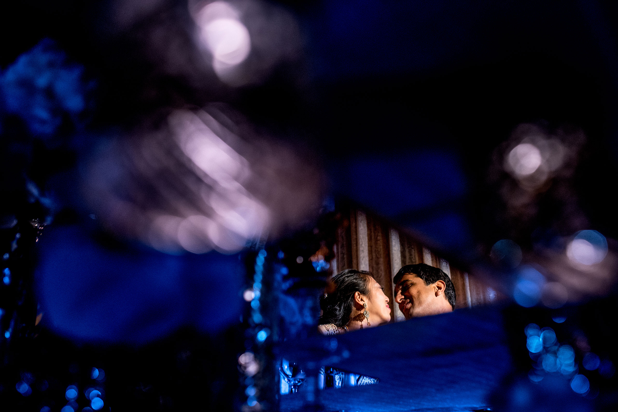 bride and groom about to kiss for cascade ballroom banff springs wedding by sean leblanc