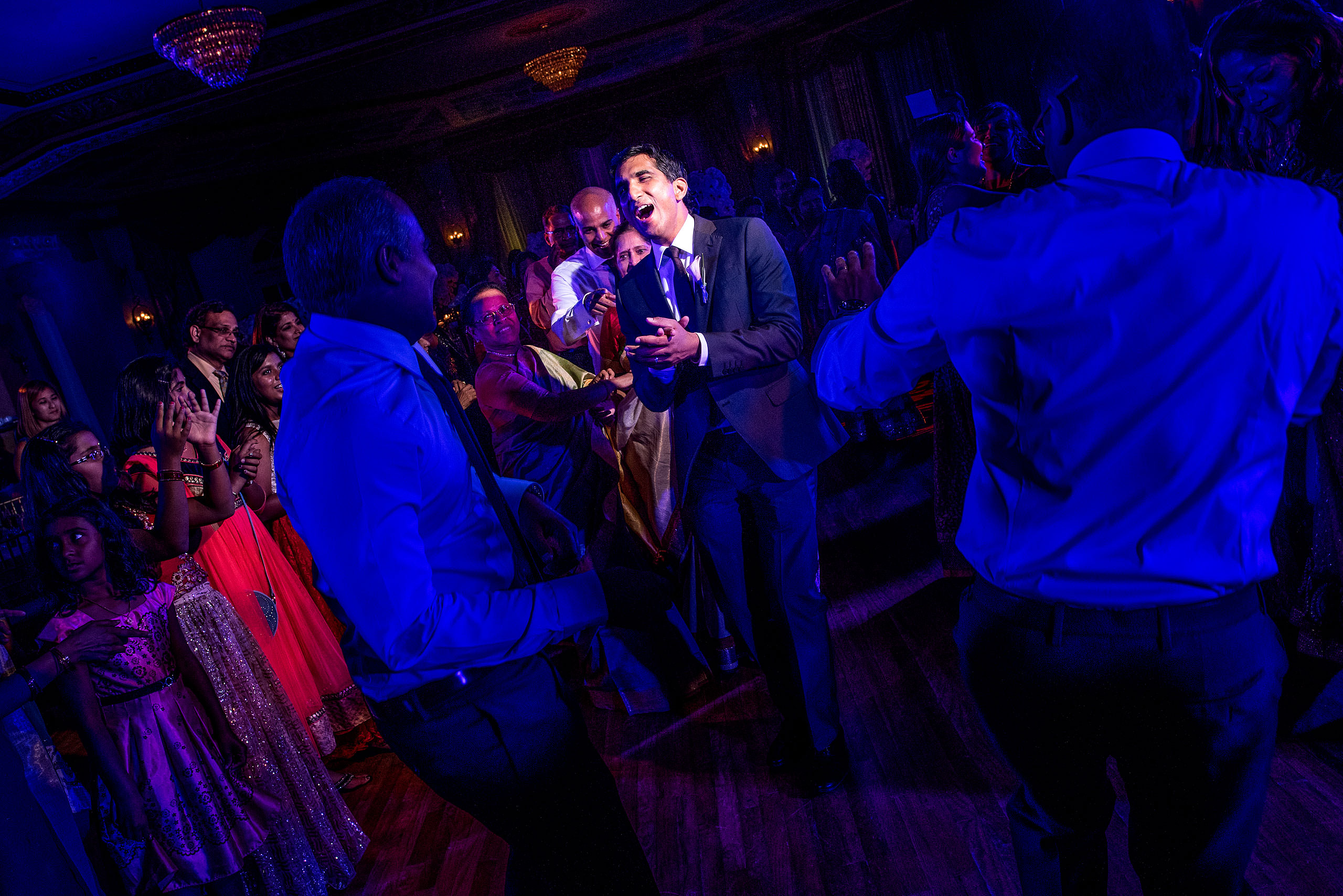 indian groom dancing at reception for cascade ballroom banff springs wedding by sean leblanc