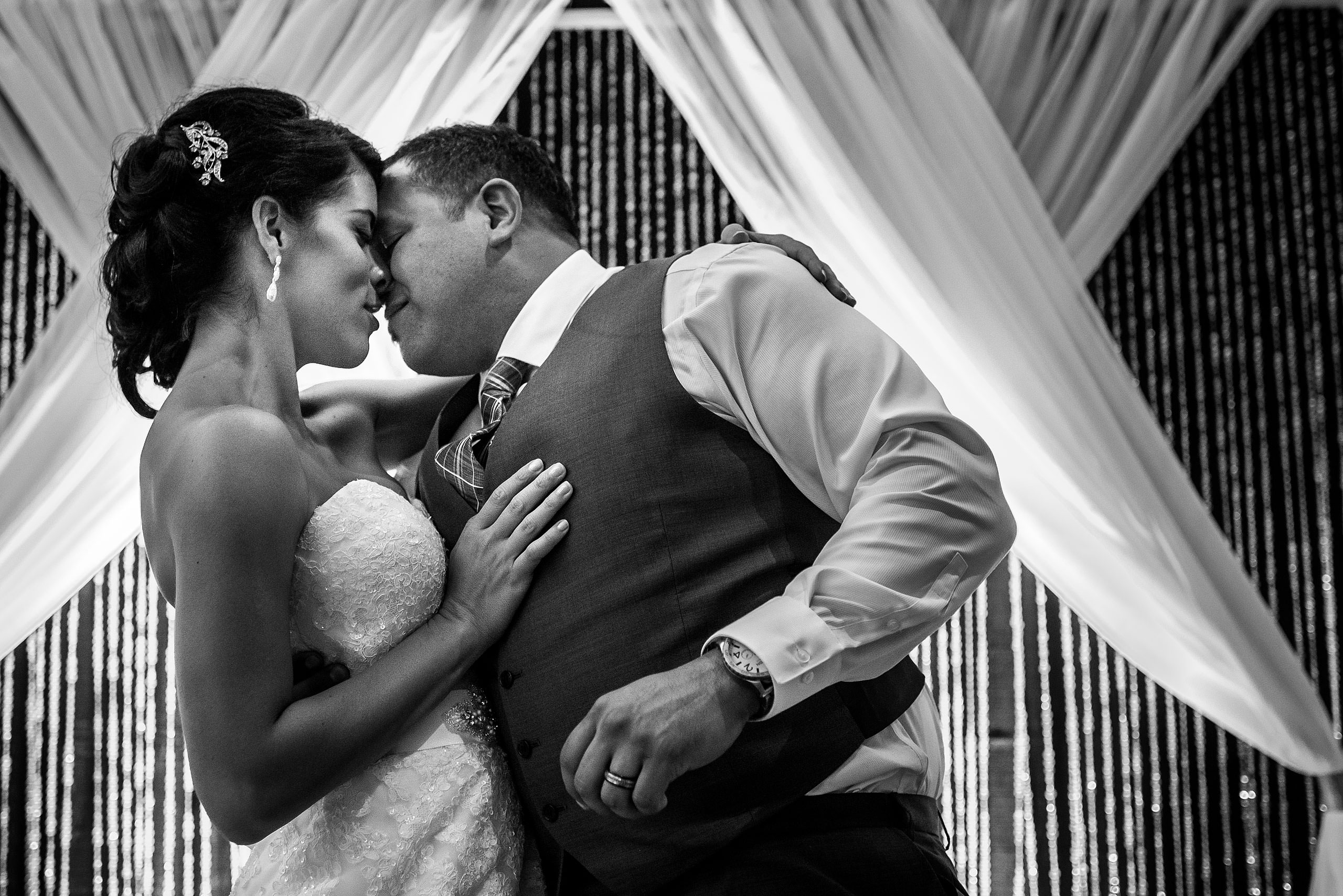 a groom and bride kissing by Edmonton wedding photographer sean leblanc