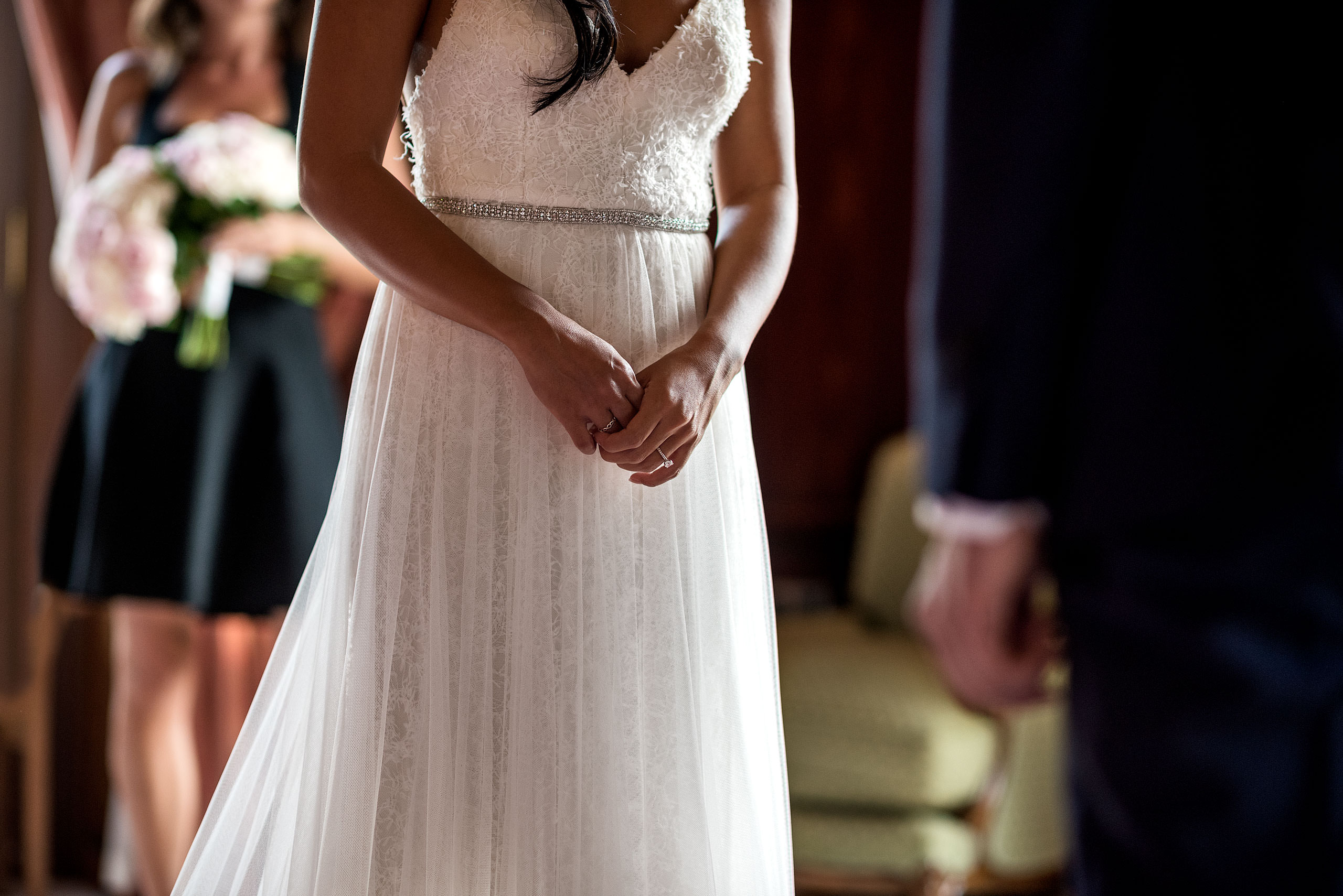 a bride crossing her hands at castillo hotel son vida destination wedding by sean leblanc