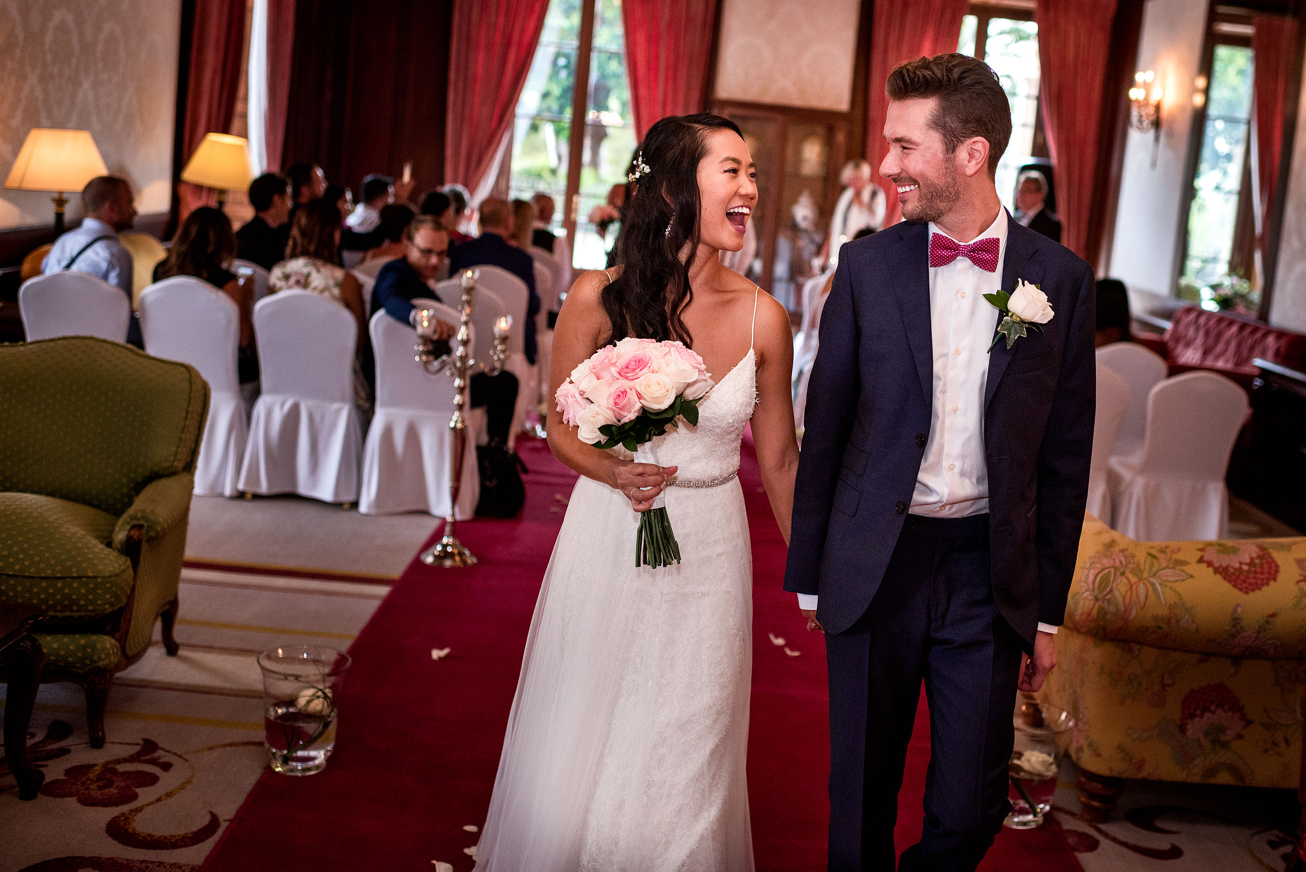 a bride and groom walking down the aisle at castillo hotel son vida destination wedding by sean leblanc