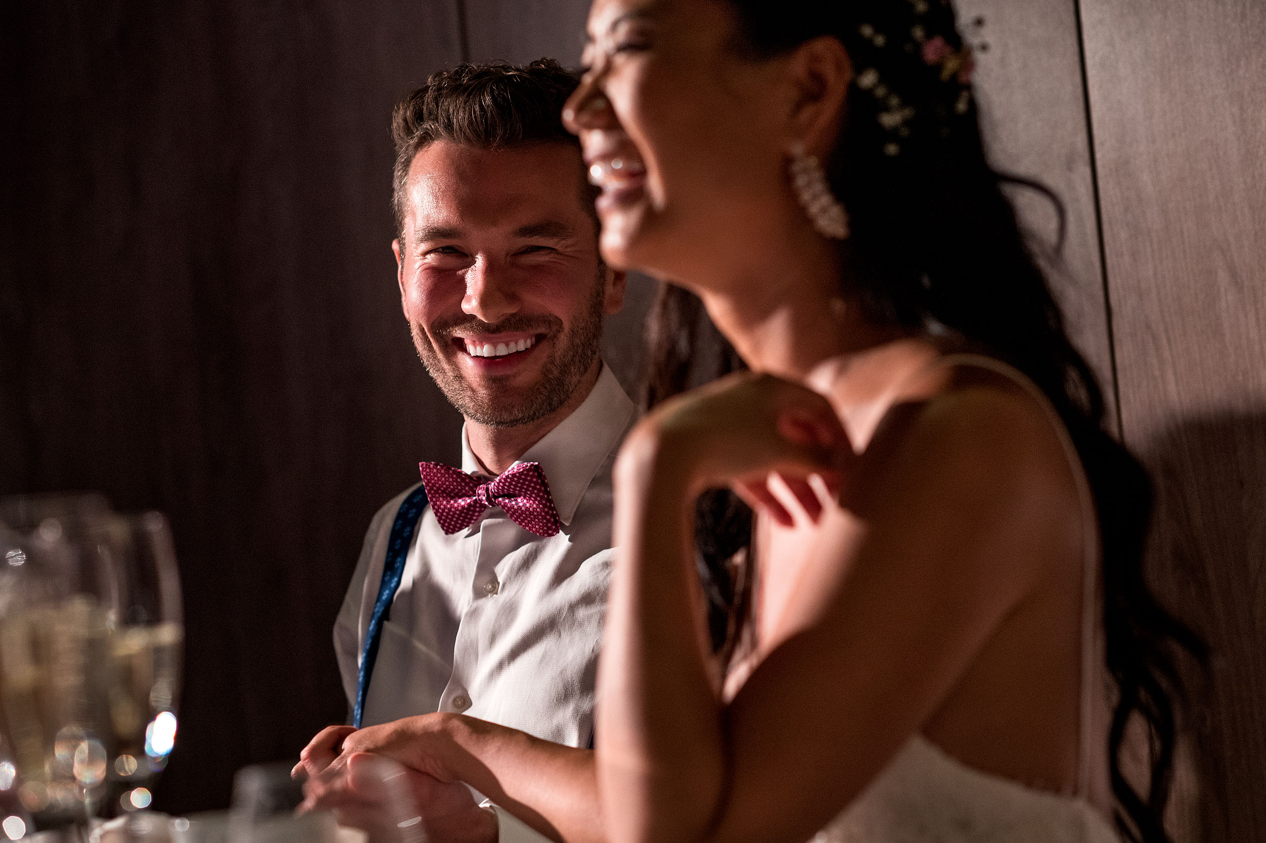 a groom smiling at his bride at castillo hotel son vida destination wedding by sean leblanc