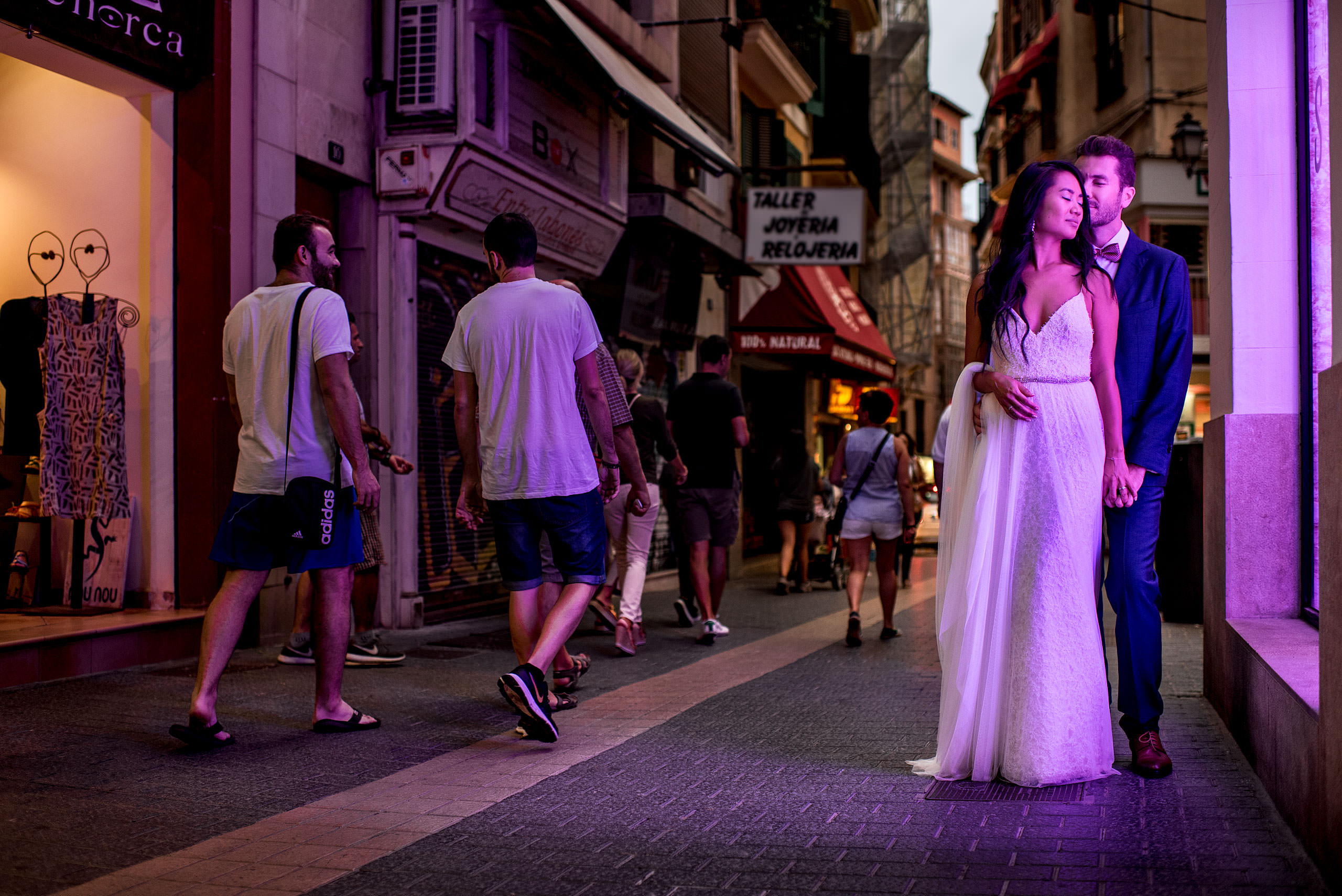 a bride and groom in the city of Palma at castillo hotel son vida destination wedding by sean leblanc