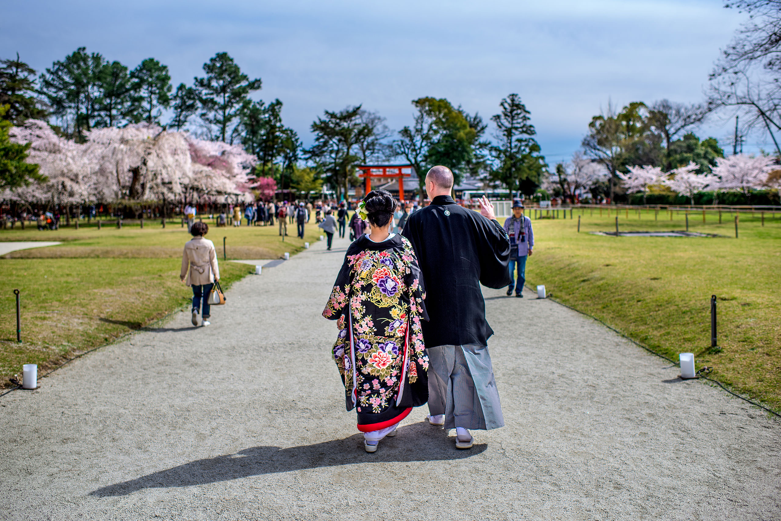 a japanese bride and groom walking in a garden by Japan Destination Wedding Photographer Sean LeBlanc