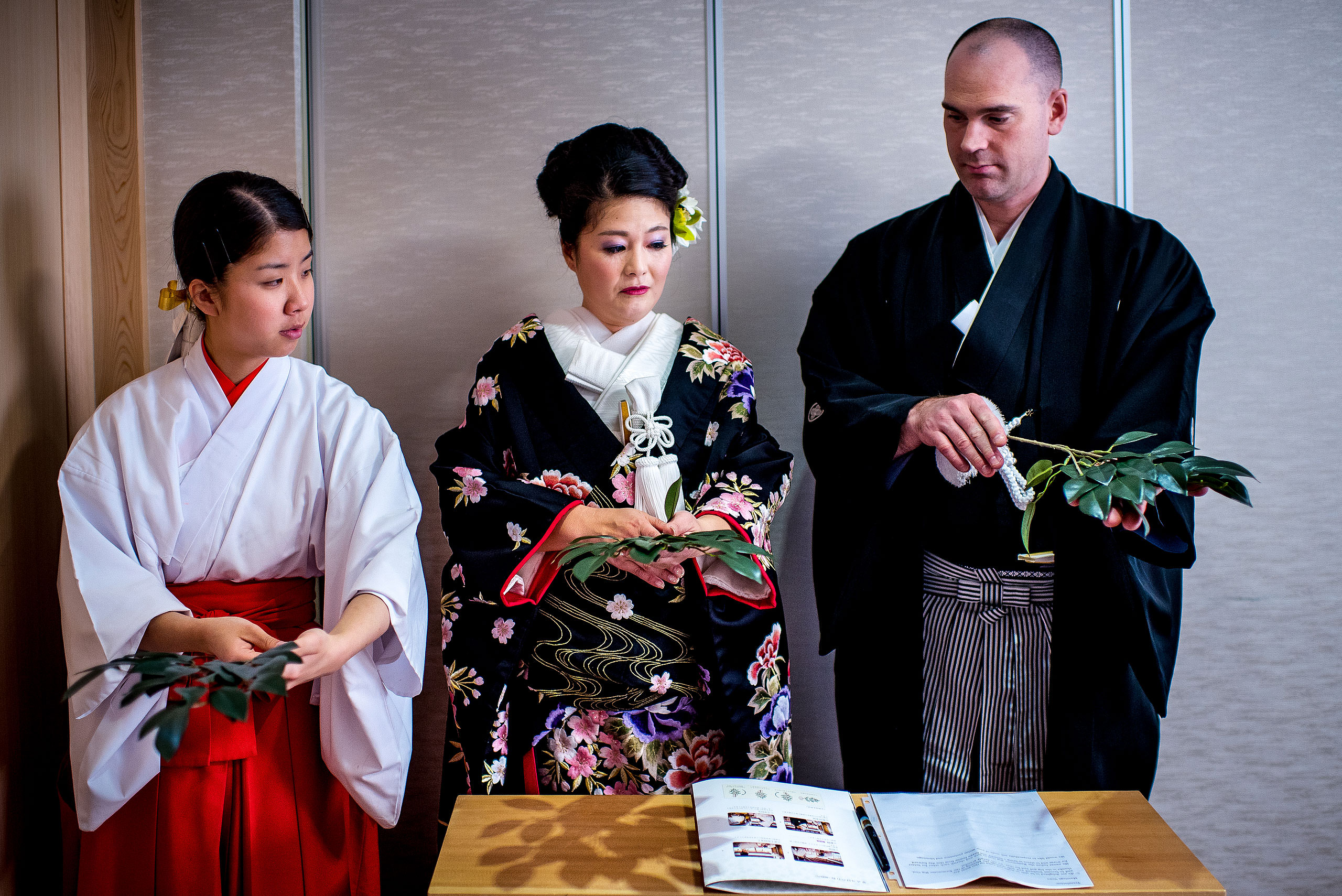 a Japanese bride and groom getting ready before thier wedding ceremony by Japan Destination Wedding Photographer Sean LeBlanc