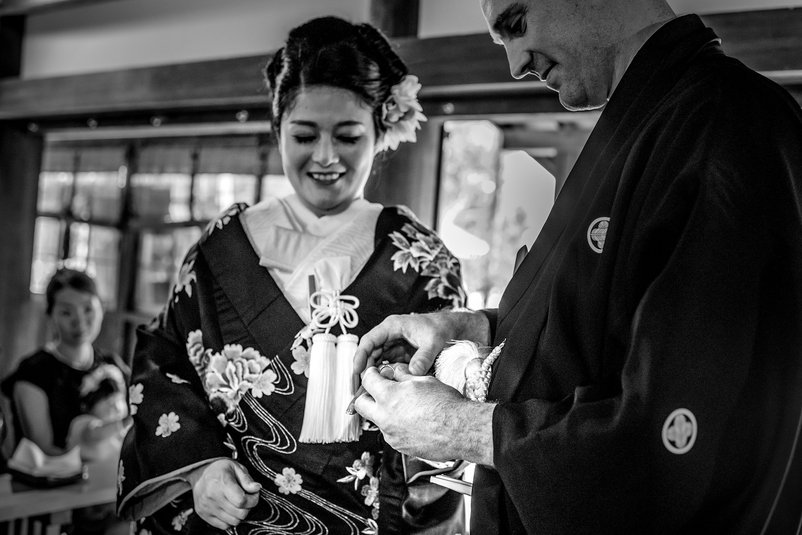 a Japanese bride and groom opening a gift by Japan Destination Wedding Photographer Sean LeBlanc