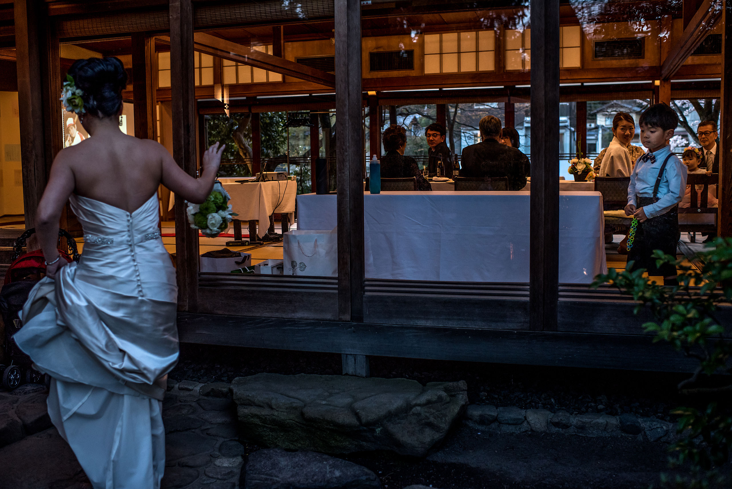 a bride walking into a wedding reception by Japan Destination Wedding Photographer Sean LeBlanc