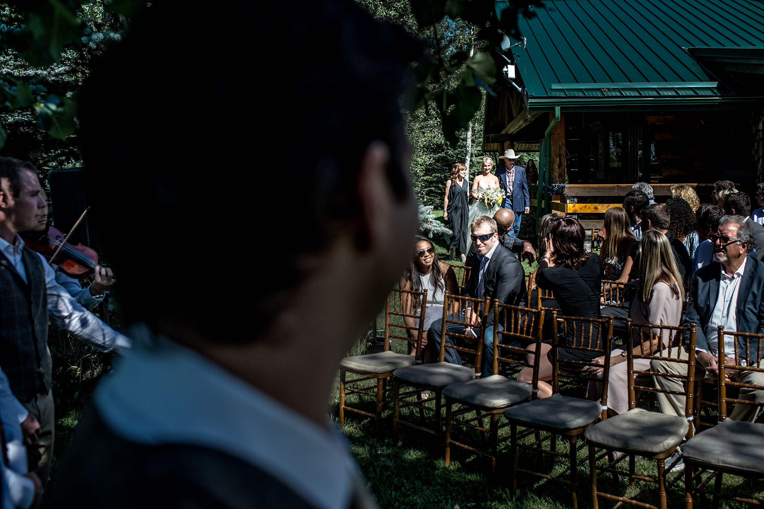 groom seeing his bride walk down the aisle at Cochrane Country Wedding by Sean LeBlanc