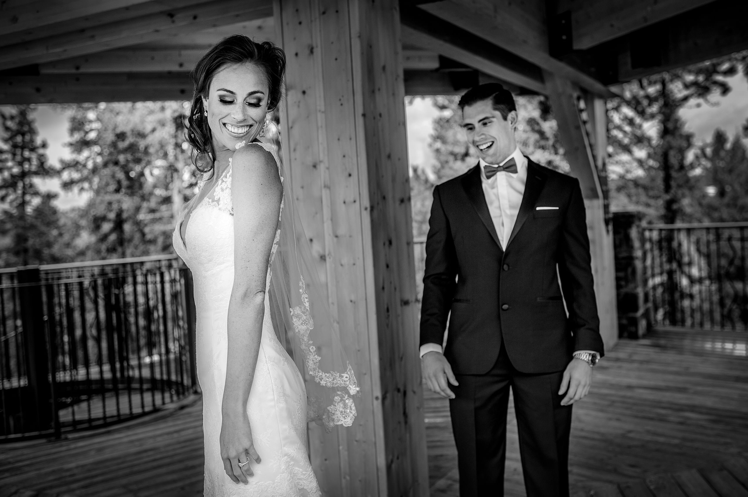 a bride spinning with her groom at Priddis Azuridge Wedding by sean leblanc