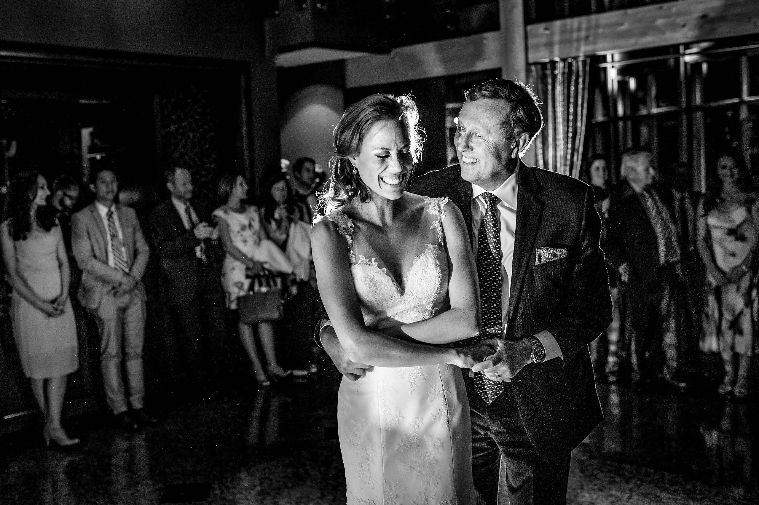 bride dancing with her dad at her wedding reception at Priddis Azuridge Wedding by sean leblanc