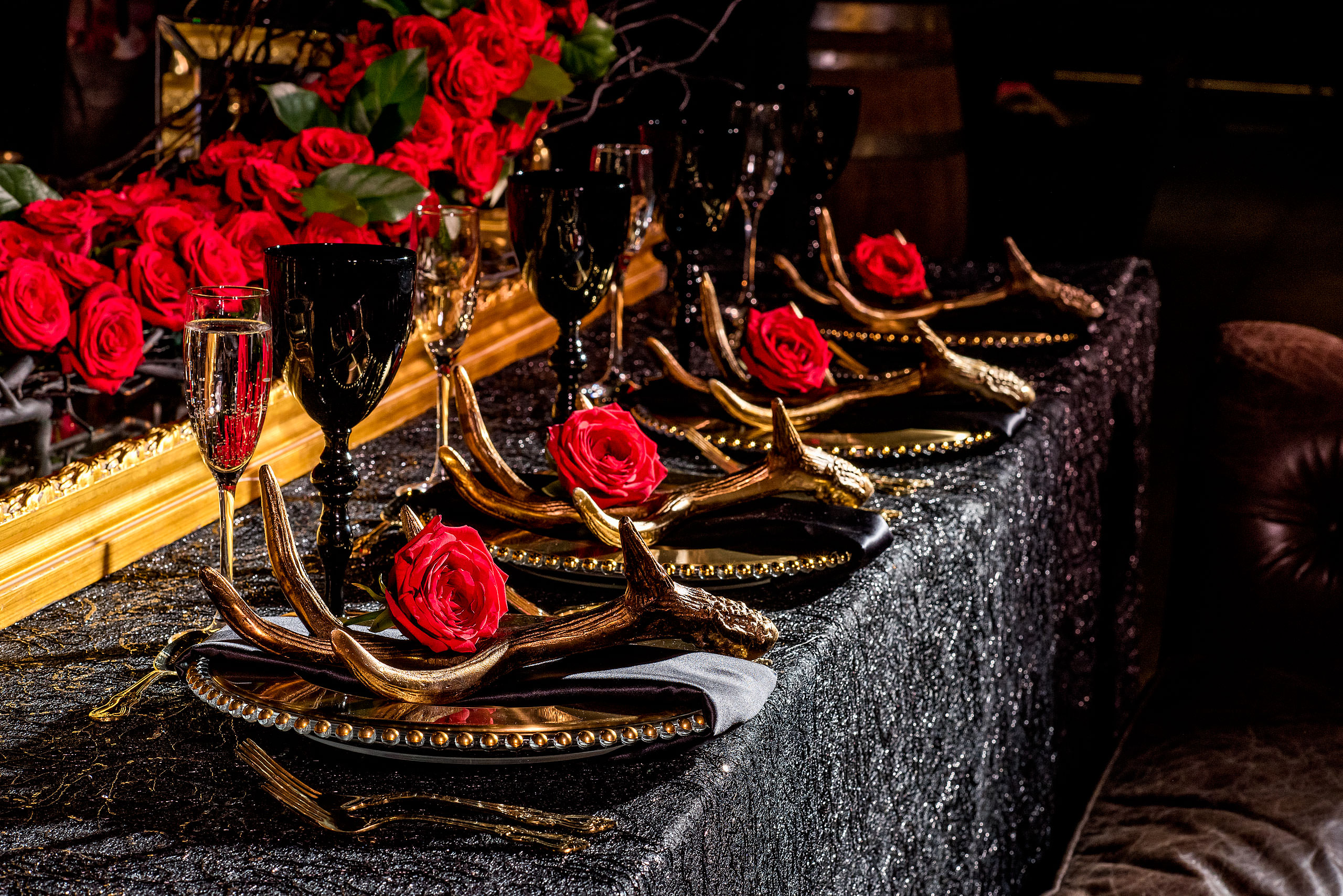 a row of plates with roses beside them by calgary confetti fashion photographer sean leblanc