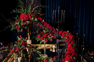 a long string of roses suspended above a mirror by calgary confetti fashion photographer sean leblanc