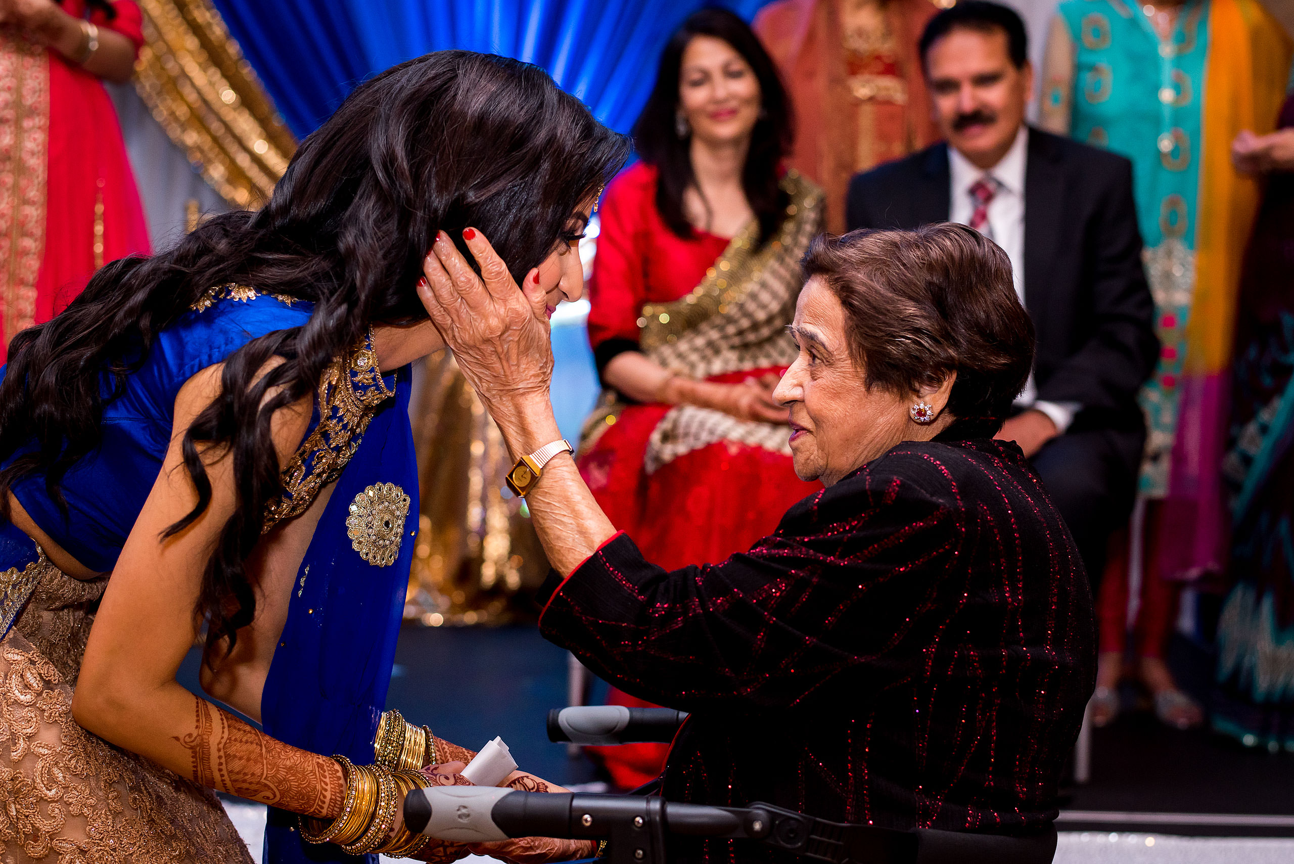 a grandma showing embracing her grand daughter by Calgary Banff Wedding Photographer Sean LeBlanc