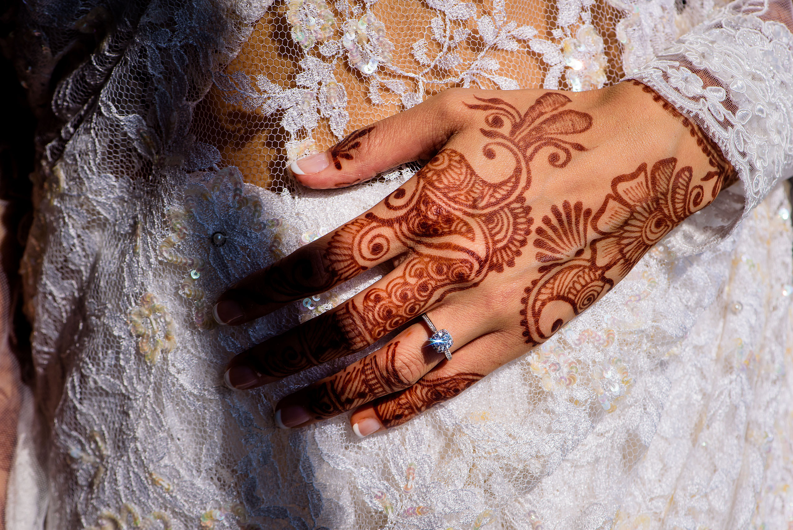 a close up photo on an Indian bride's wedding ring by Calgary Banff Wedding Photographer Sean LeBlanc