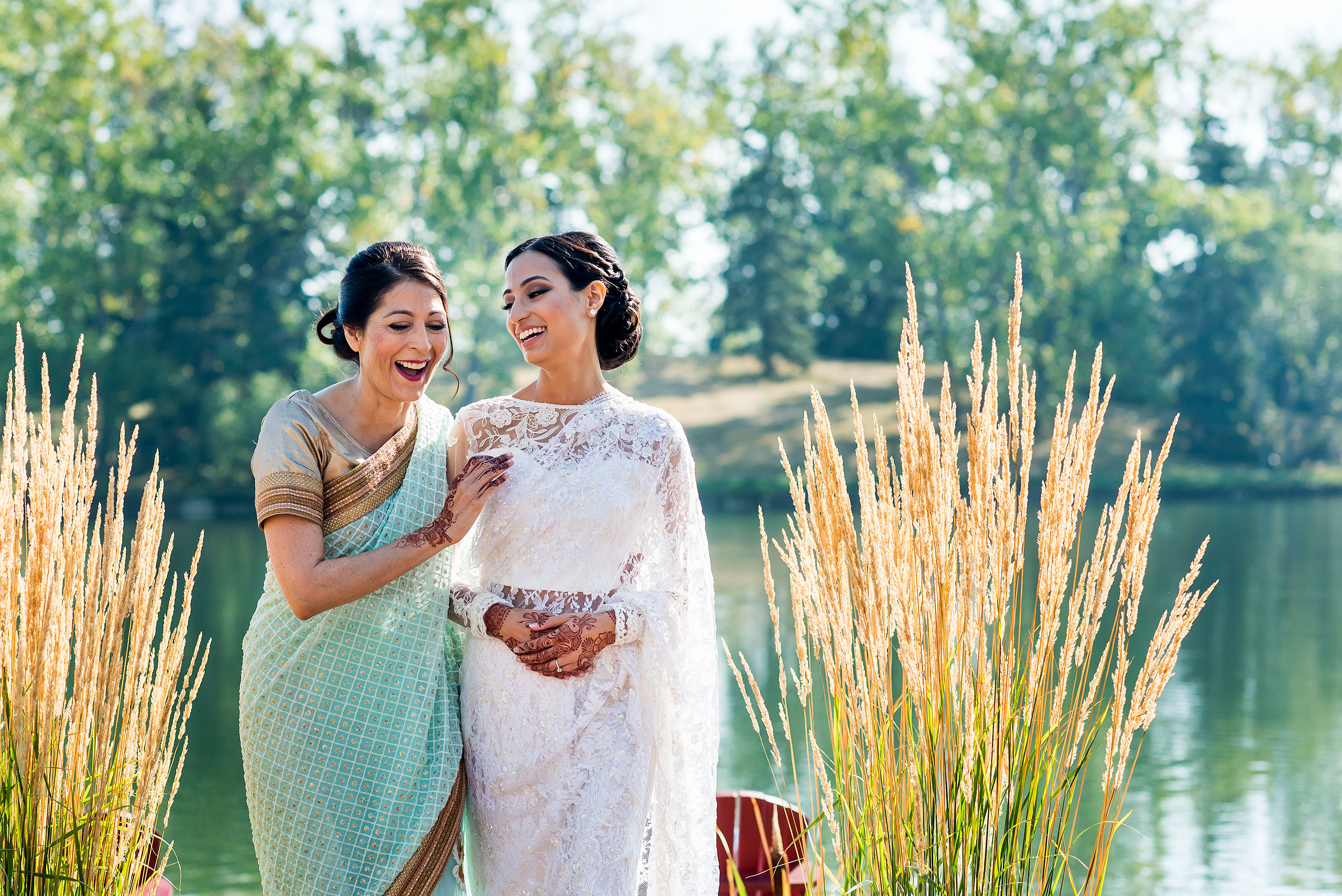 a mom and daughter laughing together by Calgary Banff Wedding Photographer Sean LeBlanc