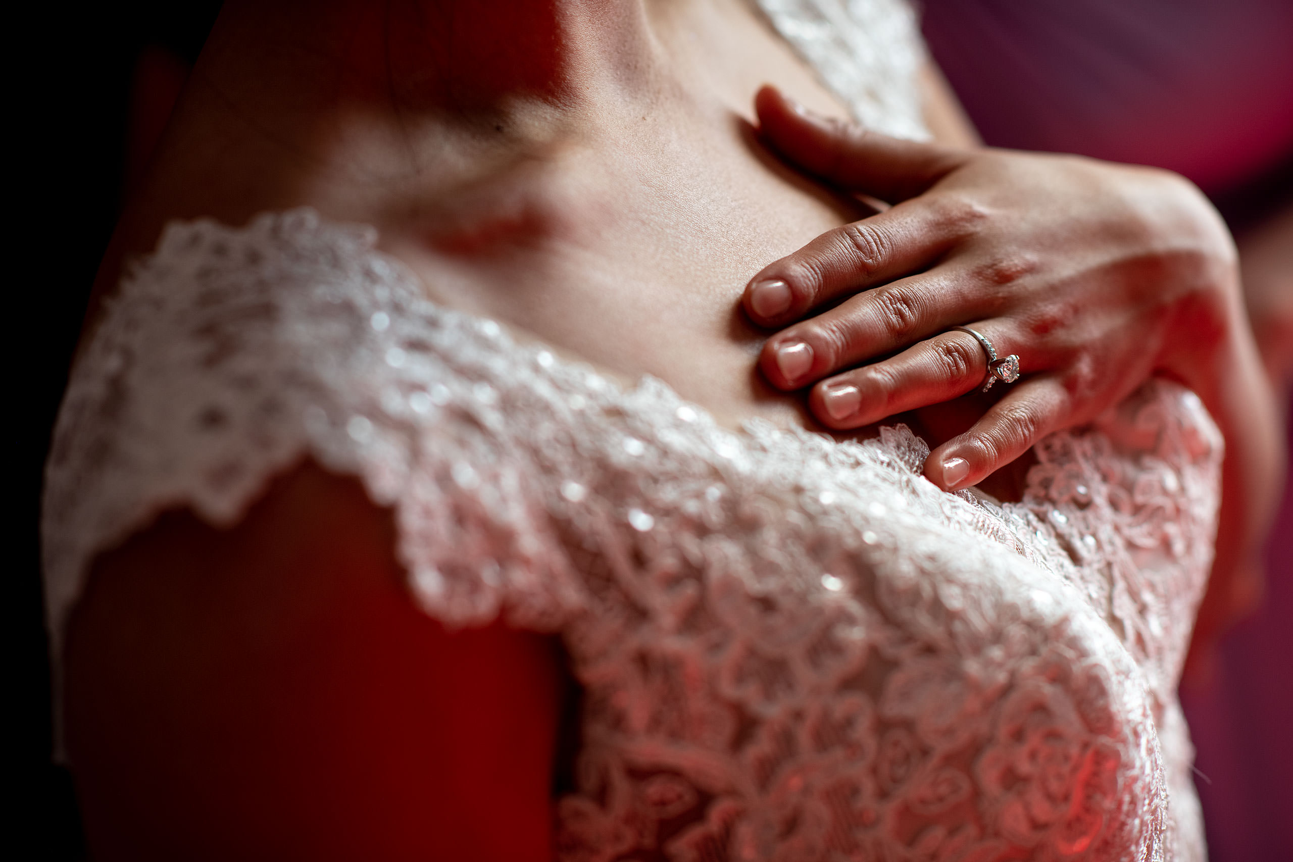 a bride with her wedding ring for her calgary lake house wedding by calgary wedding photographer sean leblanc photography