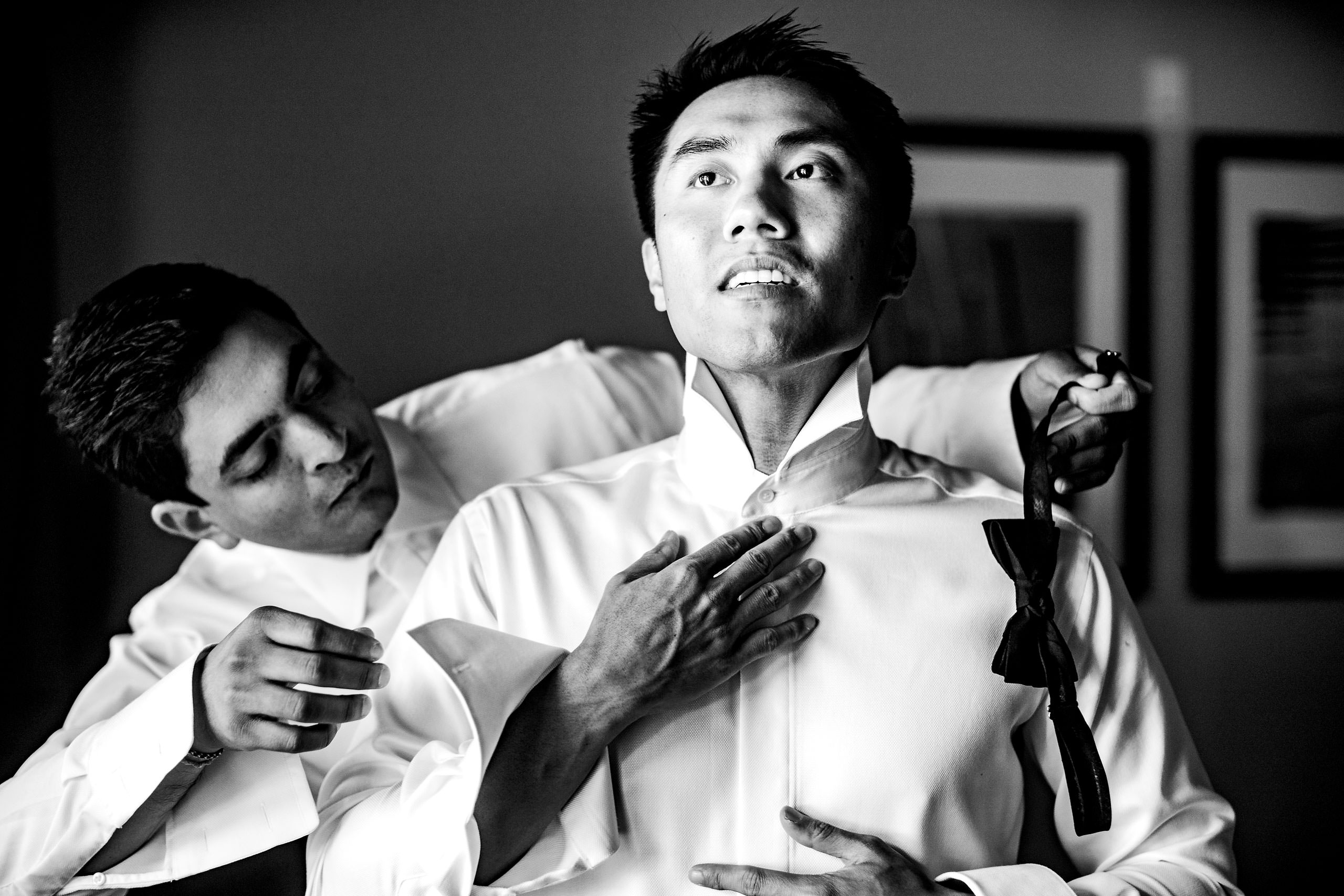 Groom getting ready by Carmel Valley Ranch Wedding Photographer Sean LeBlanc