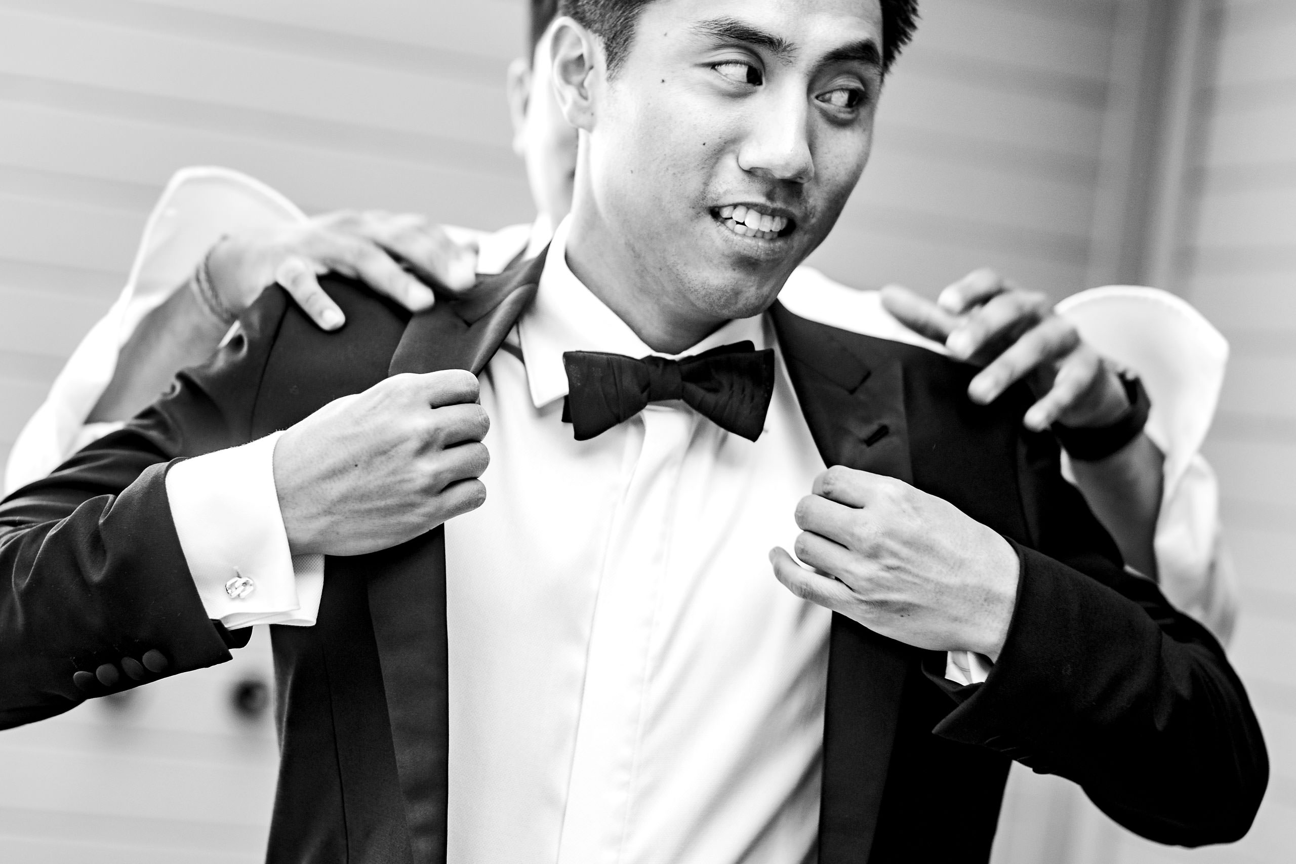 Groom getting ready by Carmel Valley Ranch Wedding Photographer Sean LeBlanc