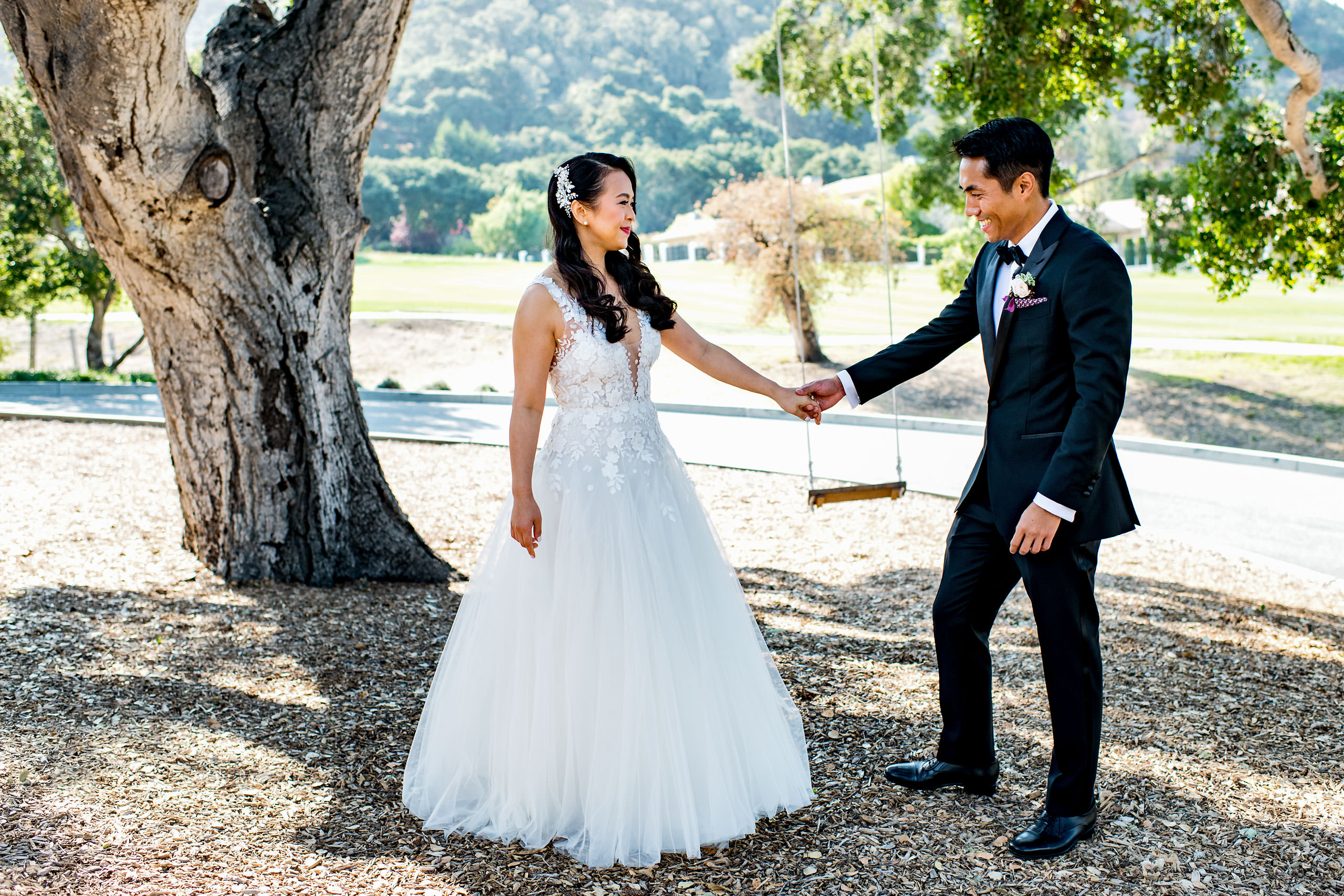 First look by a swing by Carmel Valley Ranch Wedding Photographer Sean LeBlanc